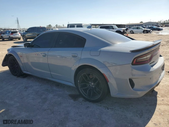 2022 Dodge Charger Scat Pack with VIN 2C3CDXGJ4NH222332, listed as a Copart auction lot 87069084 with 58,362 mi miles and Salvage Title. Bid and sale history available at carsss.com. Image 2.