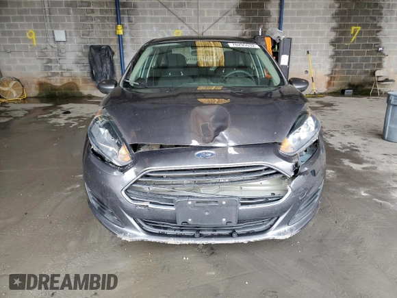 2017 Ford Fiesta SE z VIN 3FADP4BJ9HM165523, wystawiony jako Copart lot #70295532 z przebiegiem 91 318 mil mil oraz Szkoda całkowita • Salvage title. Historia ofert i sprzedaży dostępna na DreamBid. Obrazek 5.