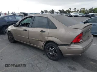 2003 Ford Focus SE z VIN 1FAFP34Z73W236474, wystawiony jako IAAI lot #39378102 z przebiegiem 183 280 mil mil oraz . Historia ofert i sprzedaży dostępna na DreamBid. Obrazek 3.