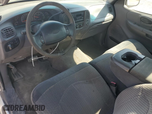 2000 Ford F-150 XL with VIN 1FTRF17W3YNB65349, listed as a Copart auction lot 52551895 with Not provided miles and Salvage title. Bid and sale history available at DreamBid. Image 8.