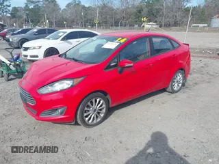 2014 Ford Fiesta SE with VIN 3FADP4BJ8EM170837, listed as a IAAI auction lot 41656071 with 128,334 mi miles and . Bid and sale history available at DreamBid. Image 2.