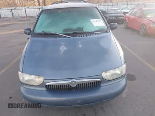 1999 Mercury Villager z VIN 4M2XV11T2XDJ31443, wystawiony jako IAAI lot #41747627 z przebiegiem 266 085 mil mil oraz . Historia ofert i sprzedaży dostępna na DreamBid. Obrazek 6.