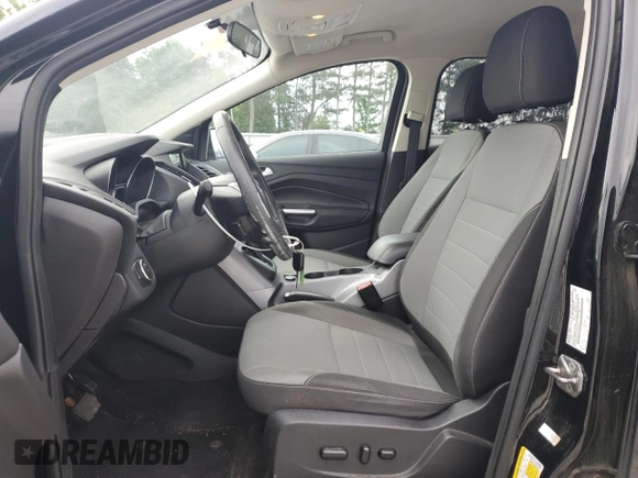 2016 Ford Escape SE z VIN 1FMCU0GX9GUB56962, wystawiony jako Copart lot #57071515 z przebiegiem 150 792 mil mil oraz Szkoda całkowita • Salvage title. Historia ofert i sprzedaży dostępna na DreamBid. Obrazek 7.