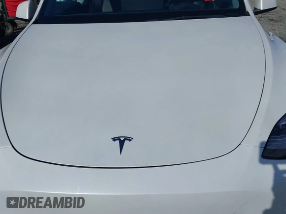 2021 Tesla Model Y Standard Range with VIN 5YJYGDED9MF110697, listed as a IAAI auction lot 41707730 with Not Provided miles and . Bid and sale history available at carsss.com. Image 10.