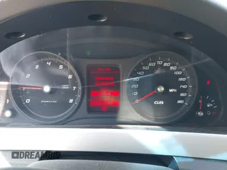 2009 Pontiac G8 with VIN 6G2ER57769L185606, listed as a IAAI auction lot 42112142 with 187,365 mi miles. Bid and sale history available at carsss.com. Image 7.