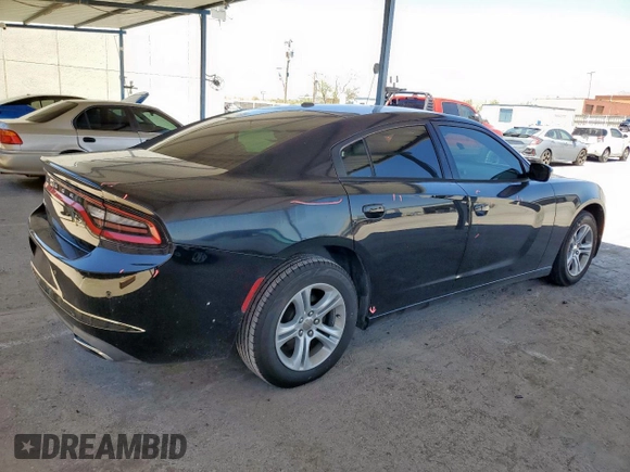 2015 Dodge Charger SE z VIN 2C3CDXBGXFH716742, wystawiony jako Copart lot #60039165 z przebiegiem 153 278 mil mil oraz Szkoda całkowita • Salvage title. Historia ofert i sprzedaży dostępna na DreamBid. Obrazek 3.