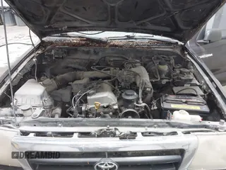 1999 Toyota Tacoma with VIN 4TAWM72N5XZ433296, listed as a IAAI auction lot 42595432 with 233,075 mi miles and . Bid and sale history available at DreamBid. Image 10.