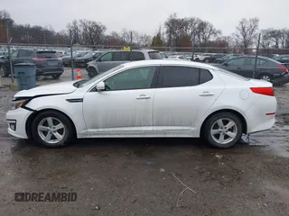 2014 Kia Optima LX z VIN KNAGM4A78E5484514, wystawiony jako IAAI lot #41227492 z przebiegiem 118 531 mil mil oraz . Historia ofert i sprzedaży dostępna na DreamBid. Obrazek 14.
