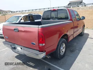 2002 Ford F-150 XL with VIN 1FTRX17LX2NB30978, listed as a IAAI auction lot 41979756 with 225,030 mi miles. Bid and sale history available at carsss.com. Image 4.