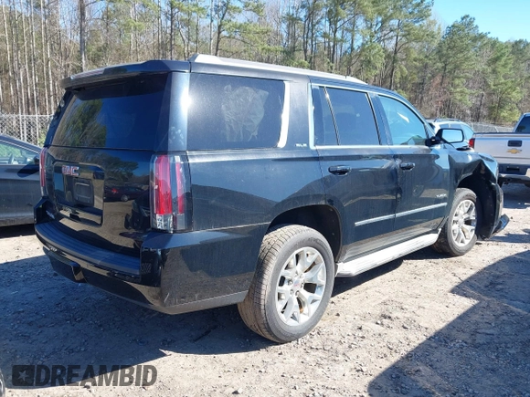 2015 GMC Yukon SLE with VIN 1GKS2AKC4FR720667, listed as a IAAI auction lot 41822277 with 134,984 mi miles and . Bid and sale history available at DreamBid. Image 4.