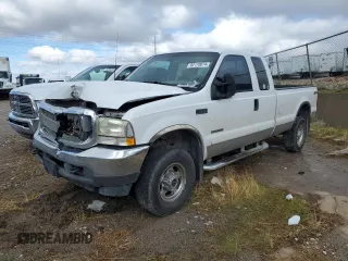 2002 Ford F-350 XL with VIN 1FTSX31FX2EA62875, listed as a Copart auction lot 82170074 with 172,187 mi miles and Salvage title. Bid and sale history available at DreamBid. Image 1.