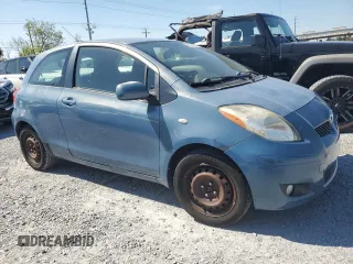 2011 Toyota Yaris with VIN JTDJT4K35B5330328, listed as a Copart auction lot 46904665 with 107,100 mi miles and Salvage Title. Bid and sale history available at carsss.com. Image 4.