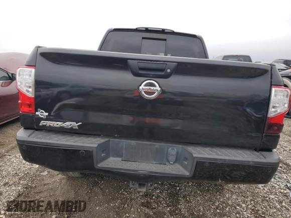 2018 Nissan Titan Pro-4X z VIN 1N6AA1E58JN523036, wystawiony jako Copart lot #45383075 z przebiegiem 153 047 mil mil oraz Czysty tytuł • Clean title. Historia ofert i sprzedaży dostępna na DreamBid. Obrazek 6.