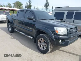 2007 Toyota Tacoma z VIN 5TEMU52N07Z409511, wystawiony jako IAAI lot #42237569 z przebiegiem 167 349 mil mil oraz . Historia ofert i sprzedaży dostępna na DreamBid. Obrazek 1.