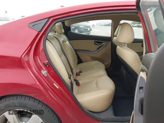 2012 Hyundai Elantra Limited with VIN KMHDH4AE4CU299884, listed as a IAAI auction lot 42032017 with 148,216 mi miles. Bid and sale history available at carsss.com. Image 8.