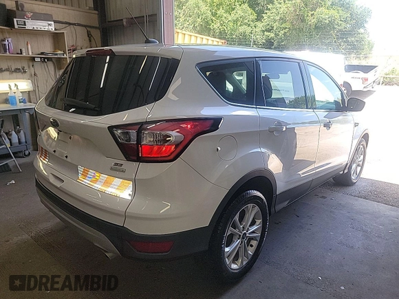 2017 Ford Escape SE z VIN 1FMCU0GD4HUC98854, wystawiony jako IAAI lot #42558269 z przebiegiem 62 975 mil mil oraz . Historia ofert i sprzedaży dostępna na DreamBid. Obrazek 25.