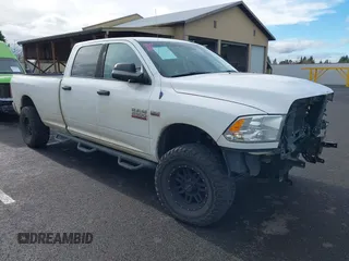 2013 Ram 2500 SLT with VIN 3C6TR5JT5DG517635, listed as a IAAI auction lot 40950960 with 99,372 mi miles and . Bid and sale history available at DreamBid. Image 1.