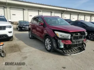 2017 Ford Escape Titanium with VIN 1FMCU0J99HUA37823, listed as a Copart auction lot 48224185 with 133,633 mi miles and Salvage Title. Bid and sale history available at DreamBid. Image 12.