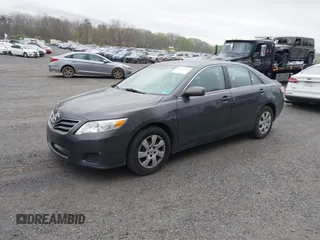 2011 Toyota Camry LE with VIN 4T1BF3EKXBU719590, listed as a IAAI auction lot 42007659 with 232,349 mi miles and . Bid and sale history available at DreamBid. Image 17.
