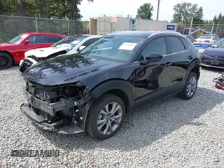 2023 Mazda CX-30 S Carbon Edition with VIN 3MVDMBCM3PM562447, listed as a IAAI auction lot 42174280 with 22,028 mi miles and . Bid and sale history available at DreamBid. Image 18.