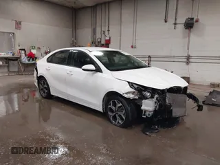 2019 Kia Forte LXS z VIN 3KPF24AD6KE042700, wystawiony jako IAAI lot #42271553 z przebiegiem 95 655 mil mil oraz . Historia ofert i sprzedaży dostępna na DreamBid. Obrazek 1.
