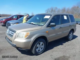 2006 Honda Pilot LX with VIN 2HKYF18106H545261, listed as a IAAI auction lot 41769869 with 214,889 mi miles. Bid and sale history available at carsss.com. Image 17.