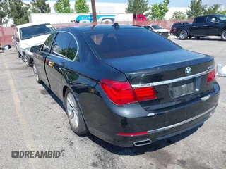 2015 BMW 7 Series 740Li with VIN WBAYE4C57FD138961, listed as a IAAI auction lot 42216122 with 224,740 mi miles and . Bid and sale history available at carsss.com. Image 6.