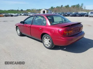 2000 Saturn SL z VIN 1G8ZK5274YZ241392, wystawiony jako IAAI lot #42168456 z przebiegiem 99 406 mil mil oraz . Historia ofert i sprzedaży dostępna na DreamBid. Obrazek 3.