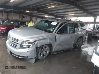 2015 Chevrolet Tahoe LTZ with VIN 1GNSCCKC5FR123099, listed as a IAAI auction lot 41391974 with Not provided miles and . Bid and sale history available at DreamBid. Image 14.