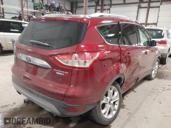 2014 Ford Escape Titanium with VIN 1FMCU9J9XEUA51732, listed as a IAAI auction lot 41542867 with 44,141 mi miles. Bid and sale history available at carsss.com. Image 4.