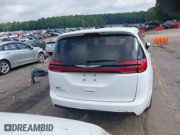 2023 Chrysler Pacifica Touring L with VIN 2C4RC1BG8PR535446, listed as a IAAI auction lot 42307923 with 65,718 mi miles and . Bid and sale history available at DreamBid. Image 16.