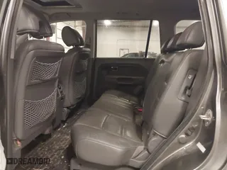 2007 Honda Pilot EX-L with VIN 2HKYF187X7H528523, listed as a IAAI auction lot 40977045 with 139,463 mi miles. Bid and sale history available at carsss.com. Image 8.