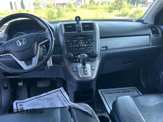 2011 Honda CR-V EX-L z VIN 5J6RE4H74BL060649, wystawiony jako Copart lot #61692905 z przebiegiem 183 943 mil mil oraz Czysty tytuł • Clean title. Historia ofert i sprzedaży dostępna na DreamBid. Obrazek 9.