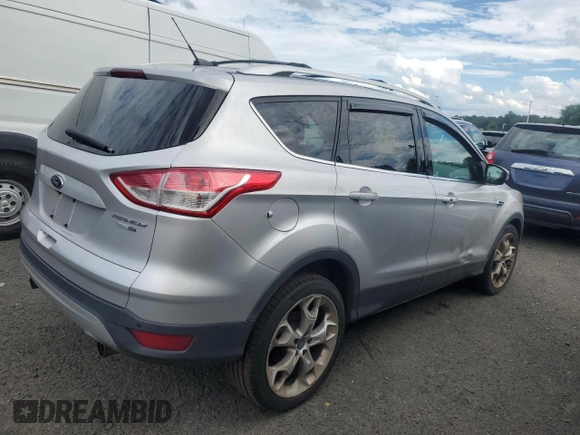 2013 Ford Escape Titanium with VIN 1FMCU9J90DUB31927, listed as a Copart auction lot 63701025 with 205,843 mi miles and Clean title. Bid and sale history available at DreamBid. Image 3.