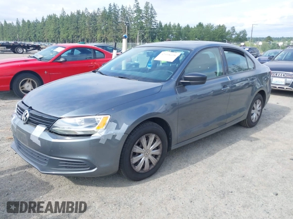 2013 Volkswagen Jetta S z VIN 3VW1K7AJ5DM242345, wystawiony jako IAAI lot #42598698 z przebiegiem 169 870 mil mil oraz . Historia ofert i sprzedaży dostępna na DreamBid. Obrazek 2.