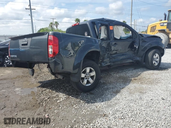 2010 Nissan Frontier Pro-4X with VIN 1N6AD0EV2AC401933, listed as a Copart auction lot 53980575 with 188,170 mi miles and Salvage title. Bid and sale history available at DreamBid. Image 3.
