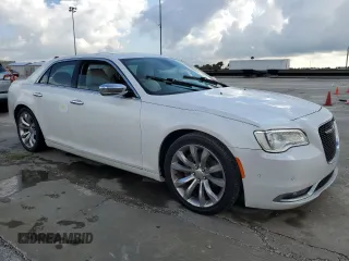 2015 Chrysler 300 C with VIN 2C3CCAET3FH830414, listed as a Copart auction lot 73649014 with Not Provided miles and Salvage Title. Bid and sale history available at DreamBid. Image 4.