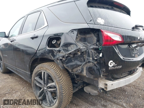 2021 Chevrolet Equinox LT with VIN 2GNAXUEV1M6109163, listed as a IAAI auction lot 42063268 with 119,412 mi miles and . Bid and sale history available at DreamBid. Image 6.