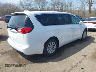 2018 Chrysler Pacifica Touring Plus with VIN 2C4RC1FG8JR125229, listed as a IAAI auction lot 41907817 with 107,914 mi miles and . Bid and sale history available at DreamBid. Image 4.