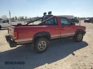 1989 Dodge Dakota z VIN 1B7GG66X6KS127702, wystawiony jako Copart lot #43276685 z przebiegiem 121 862 mil mil oraz Czysty tytuł • Clean title. Historia ofert i sprzedaży dostępna na DreamBid. Obrazek 3.