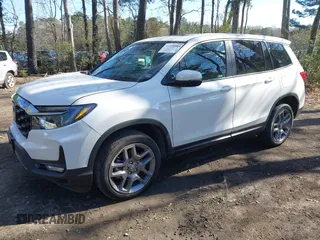 2023 Honda Passport EX-L z VIN 5FNYF8H56PB037470, wystawiony jako IAAI lot #41330084 z przebiegiem Nie podano mil oraz . Historia ofert i sprzedaży dostępna na DreamBid. Obrazek 16.