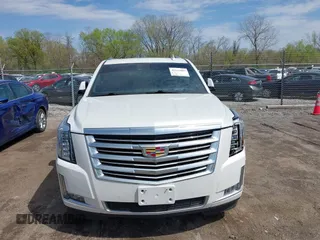 2016 Cadillac Escalade Platinum z VIN 1GYS4DKJ6GR368113, wystawiony jako IAAI lot #42115887 z przebiegiem 113 777 mil mil oraz . Historia ofert i sprzedaży dostępna na DreamBid. Obrazek 12.