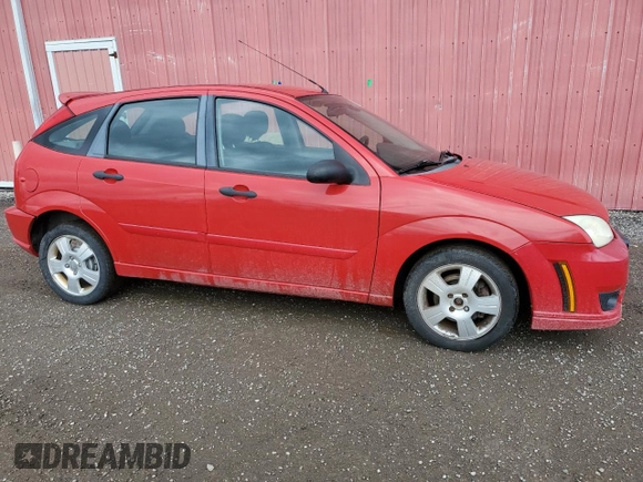 2007 Ford Focus S with VIN 1FAFP37NX7W295842, listed as a Copart auction lot 52905015 with 144,823 mi miles and Clean Title. Bid and sale history available at carsss.com. Image 4.