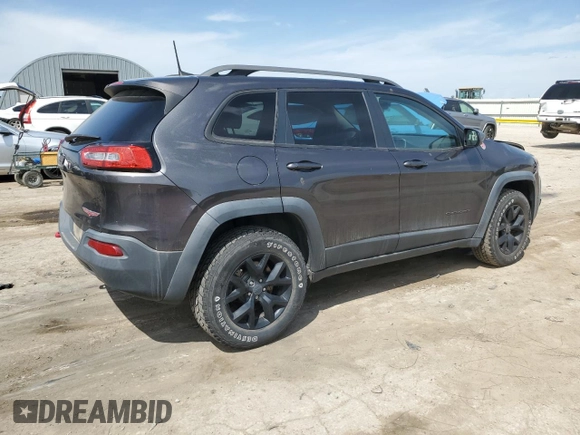 2017 Jeep Cherokee Trailhawk with VIN 1C4PJMBS0HW589626, listed as a Copart auction lot 53981435 with 105,318 mi miles and Salvage title. Bid and sale history available at DreamBid. Image 3.