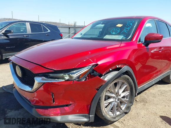 2019 Mazda CX-5 Grand Touring with VIN JM3KFADM5K1556917, listed as a IAAI auction lot 41706323 with 77,804 mi miles. Bid and sale history available at carsss.com. Image 6.