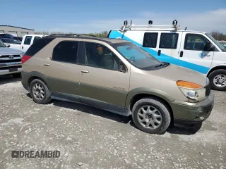 2002 Buick Rendezvous CXL with VIN 3G5DB03E02S596037, listed as a Copart auction lot 52425725 with 128,810 mi miles and Salvage Title. Bid and sale history available at DreamBid. Image 4.