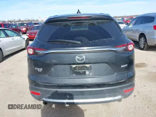 2017 Mazda CX-9 Grand Touring with VIN JM3TCBDYXH0131388, listed as a IAAI auction lot 41252943 with 61,027 mi miles. Bid and sale history available at carsss.com. Image 16.