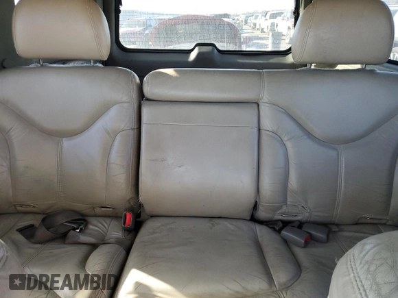 2002 GMC Yukon SLT z VIN 1GKEK13Z62R191085, wystawiony jako Copart lot #42645755 z przebiegiem 173 890 mil mil oraz Czysty tytuł • Clean title. Historia ofert i sprzedaży dostępna na DreamBid. Obrazek 10.