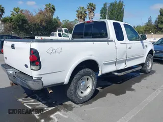 1998 Ford F-150 with VIN 1FTRX18L8WKA86341, listed as a IAAI auction lot 42222043 with 315,734 mi miles and . Bid and sale history available at DreamBid. Image 4.