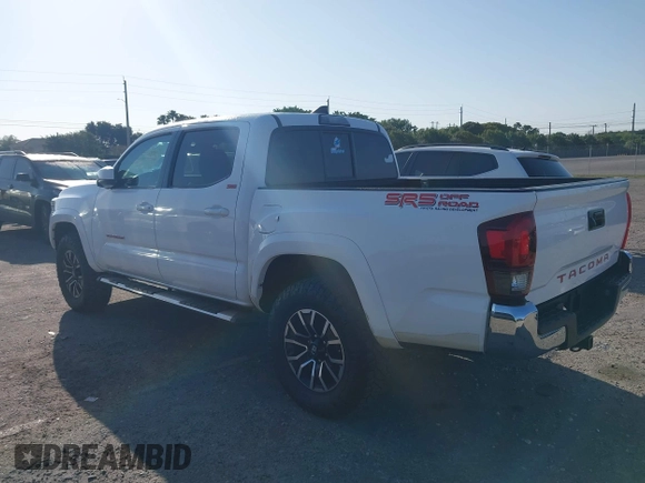 2018 Toyota Tacoma SR with VIN 5TFAX5GN2JX128621, listed as a IAAI auction lot 41797514 with 216,251 mi miles and . Bid and sale history available at DreamBid. Image 3.